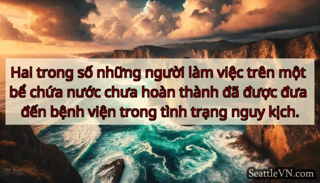 Hai trong số những người làm việc trên một bể