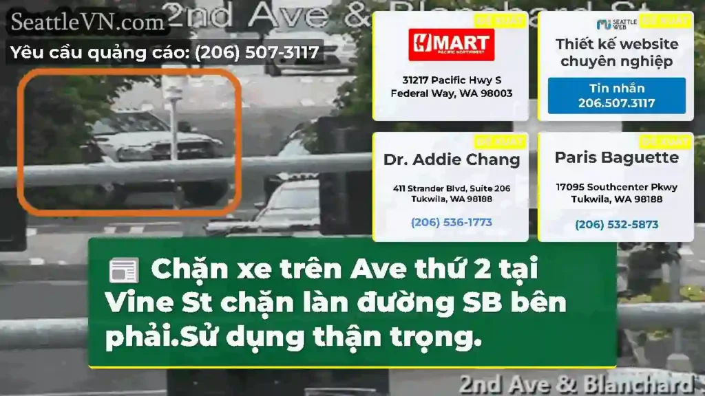 Chặn xe trên Ave thứ 2 tại Vine St chặn làn đường