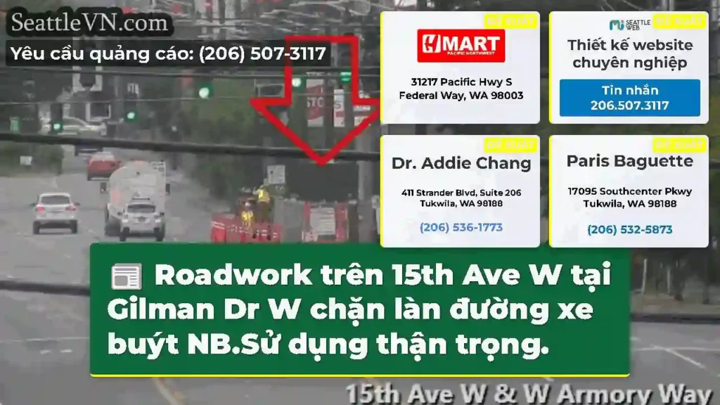 Roadwork trên 15th Ave W tại Gilman Dr W chặn làn