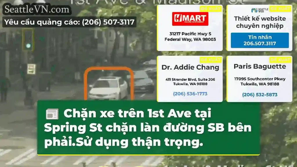 Chặn xe trên 1st Ave tại Spring St chặn làn đường