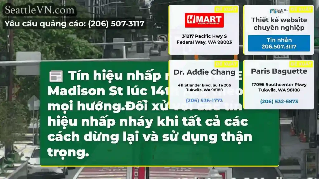 Tín hiệu nhấp nháy trên E Madison St lúc 14th Ave