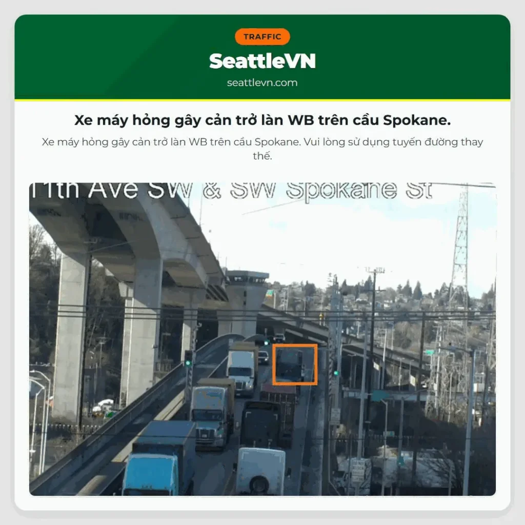 Xe máy hỏng gây cản trở làn WB trên cầu Spokane.