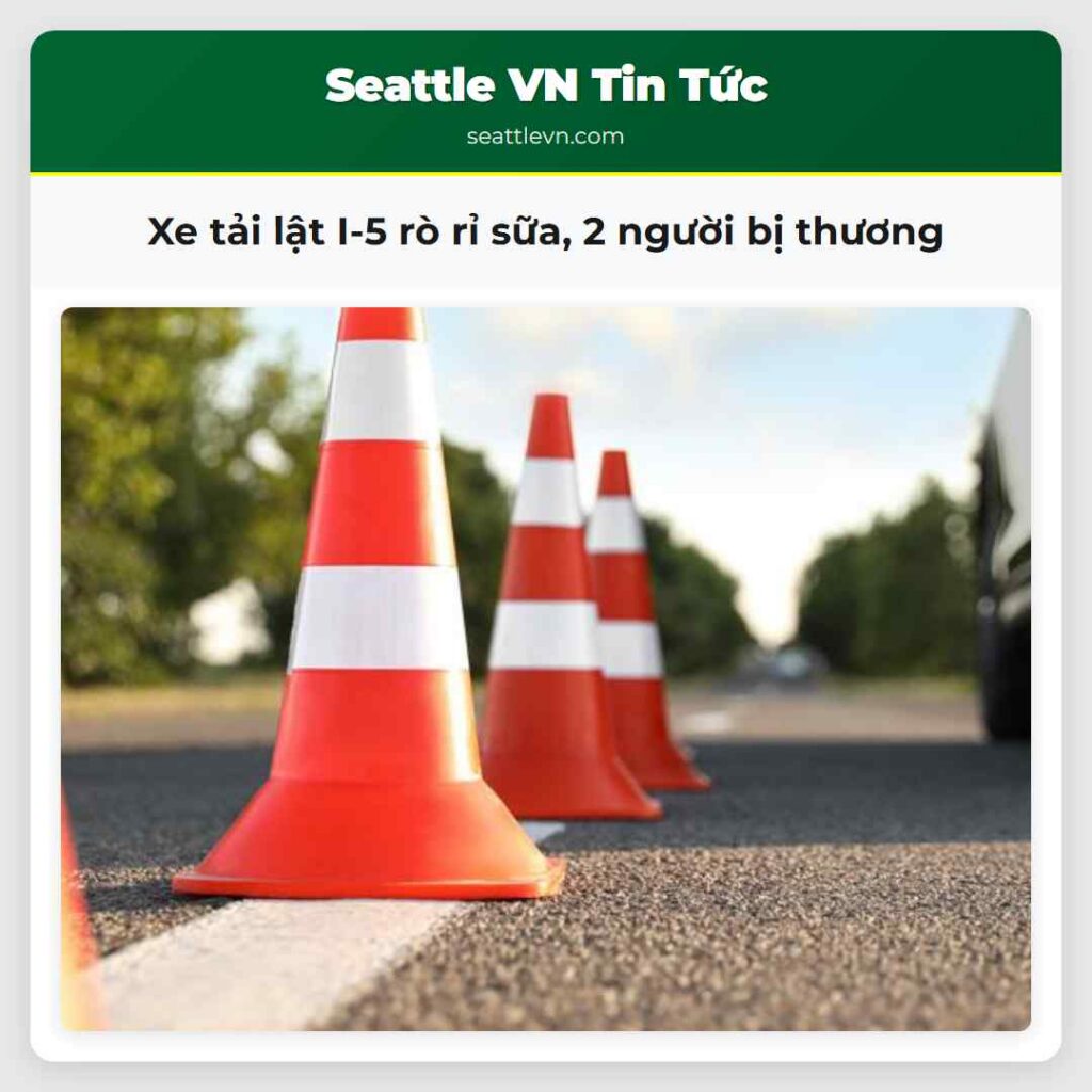 Xe tải lật I-5 rò rỉ sữa, 2 người bị thương
