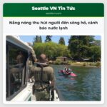 Nắng nóng thu hút người đến sông hồ cảnh báo nước lạnh